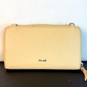 The Sak Wallet Clutch in Pale Yellow with Pin Hole Flower Detail